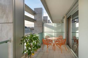 Balkoni atau teres di Precise House Mantegna Roma