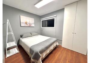 Postel nebo postele na pokoji v ubytování Hostel La Moneda