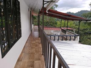a view from the balcony of a house at Finca la mariana in Pereira