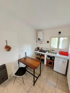 Kuchyň nebo kuchyňský kout v ubytování Rumihuasi Apartamento
