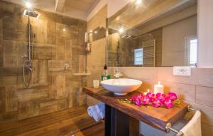 a bathroom with a sink and a shower at Oasi Relax - Romantic Room & Spa in Torretta
