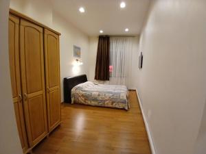 Ένα ή περισσότερα κρεβάτια σε δωμάτιο στο Donelaičio 42