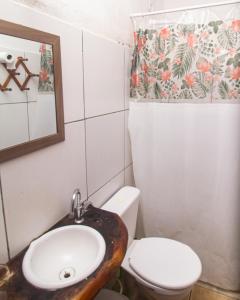 Baðherbergi á Guava Hostel Serra Grande
