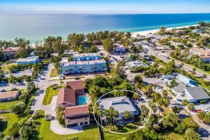 an aerial view of the resort with the ocean at Seabreeze D in Holmes Beach