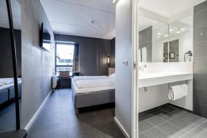 Letto o letti in una camera di Four Points Flex by Sheraton Aarhus Skejby