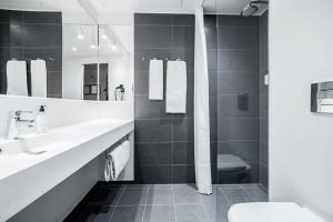 Koupelna v ubytování Four Points Flex by Sheraton Aarhus Skejby + 6 fotografií