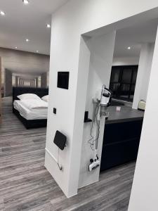 Ένα ή περισσότερα κρεβάτια σε δωμάτιο στο Wohnung im Herzen von München