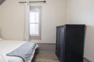 Letto o letti in una camera di Efficiency Suite in Lebanon Wifi - Laundry