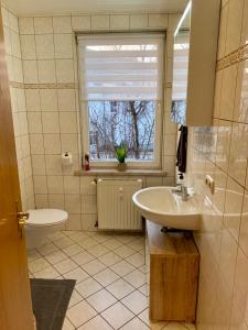 Ένα μπάνιο στο LocalBeds - Ferienwohnung Monteurwohnung