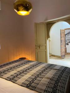 Postel nebo postele na pokoji v ubytování Riad Casa nomad