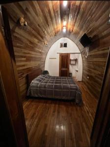 Voodi või voodid majutusasutuse Cabañas La Laguna toas