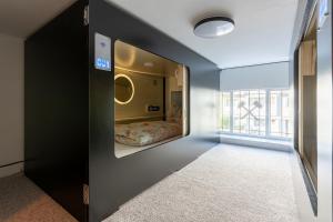 Kuchyň nebo kuchyňský kout v ubytování MUE Cubes - Capsule Hotel + 37 fotografií