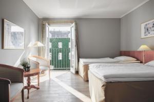 Gulta vai gultas numurā naktsmītnē Four Points Flex by Sheraton Roskilde