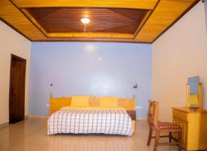 Voodi või voodid majutusasutuse The Vista Homes Kibagabaga toas