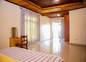 Voodi või voodid majutusasutuse The Vista Homes Kibagabaga toas