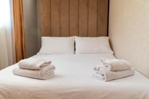 Ένα ή περισσότερα κρεβάτια σε δωμάτιο στο SHRTSTAYS - Charming Family Studio in Tangier