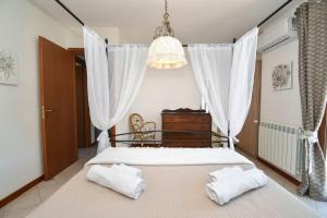 Postel nebo postele na pokoji v ubytování Casa Carini - Villa Vacanze sul Mare con piscina idromassaggio