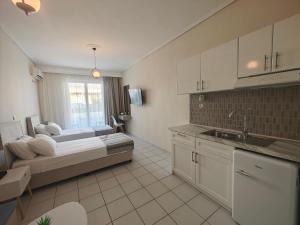 Kuchyň nebo kuchyňský kout v ubytování Marina Studio Appartments