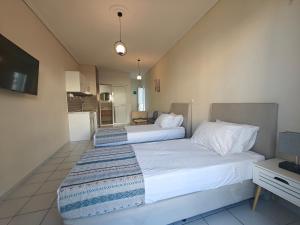 Postel nebo postele na pokoji v ubytování Marina Studio Appartments