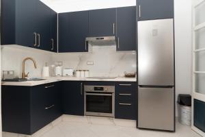Η κουζίνα ή μικρή κουζίνα στο SHRTSTAYS - Charming Family Studio in Tangier +42 φωτογραφίες