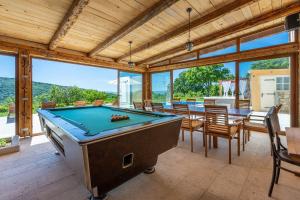 Piljardilaud majutusasutuses Atemberaubende Villa mit Whirlpool, Meerblick, Billard, Ping-Pong, Privatpool, Grill