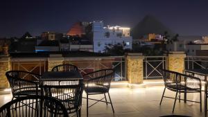 Balkón nebo terasa v ubytování Pyramids Sunlight Hotel