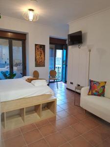 Ένα ή περισσότερα κρεβάτια σε δωμάτιο στο Real Home