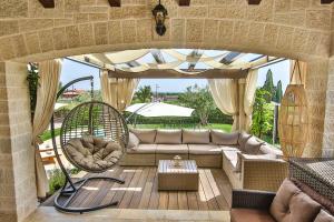 Χώρος καθιστικού στο Atemberaubende Finca mit Bikes, Salzwasserpool, Meerblick, Spielplatz, Lounge-Bereich