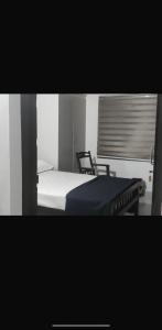 Postel nebo postele na pokoji v ubytování Mankombil Heritage Inn