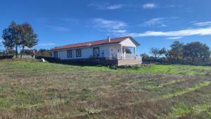 a house on a hill in a field at “Casa abella “ in Monterrei +48 photos