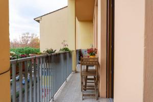 A balcony or terrace at Fabio's guesthouse&parking
