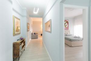 A bed or beds in a room at Fabio's guesthouse&parking
