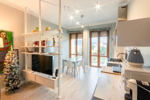 A kitchen or kitchenette at Fabio's guesthouse&parking