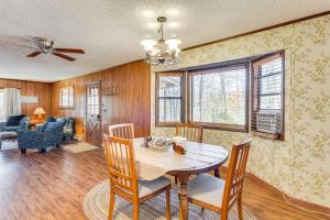 a dining room with a table and chairs at Birdwatching, Board Games and BBQs Cabin in Murphy! in Salem +16 photos