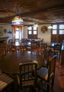 a dining room with a large table and chairs at Rancho Yapalpan in El Oro de Hidalgo