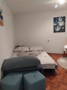 Postel nebo postele na pokoji v ubytování Studio apartman Lilijana