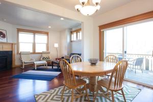 a dining room with a wooden table and chairs at Private Reserve 30 day minimum in Hood River