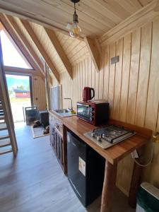 Η κουζίνα ή μικρή κουζίνα στο Cabañas ruka