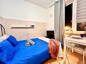 Posteľ alebo postele v izbe v ubytovaní Chopin apartments self check-in