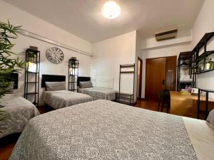 Postel nebo postele na pokoji v ubytování B&B CasaMia
