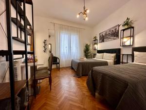 Postel nebo postele na pokoji v ubytování B&B CasaMia