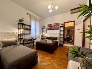 Postel nebo postele na pokoji v ubytování B&B CasaMia