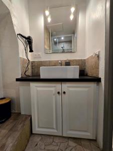 Kuchyň nebo kuchyňský kout v ubytování Appartement 2 chambres, cuisine équipée