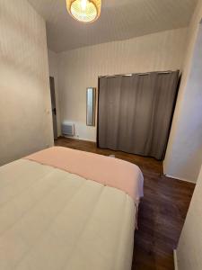 Postel nebo postele na pokoji v ubytování Appartement 2 chambres, cuisine équipée