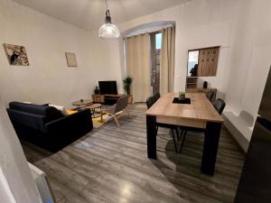 Posezení v ubytování Appartement 2 chambres, cuisine équipée