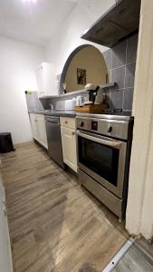 Kuchyň nebo kuchyňský kout v ubytování Appartement 2 chambres, cuisine équipée