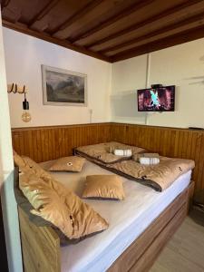 Postel nebo postele na pokoji v ubytování Apartmaji pr' Matičo