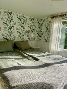 Postel nebo postele na pokoji v ubytování Solröje