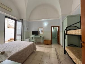 Postel nebo postele na pokoji v ubytování B&B La Corte