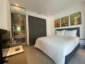 Postel nebo postele na pokoji v ubytování Coto Island Beach Village Homestay + 267 fotografií